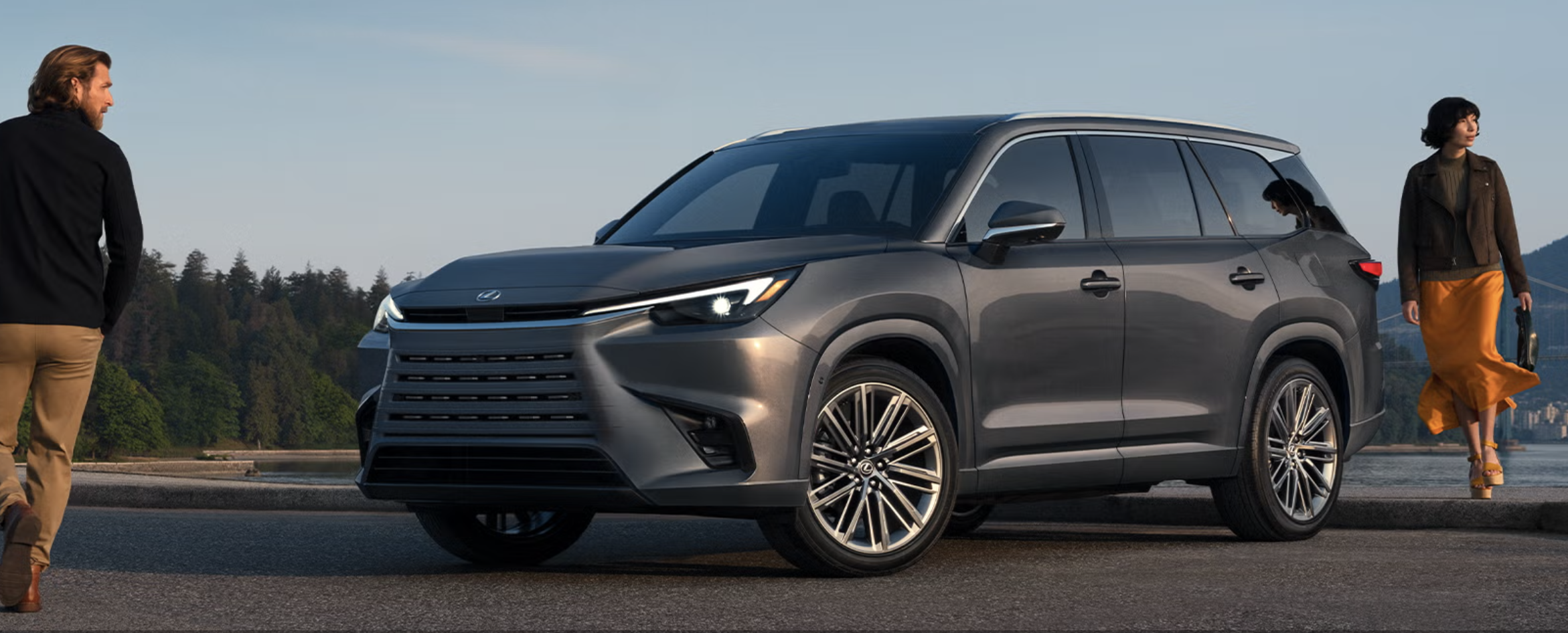 Couple entering a 2026 Lexus TX to explore latest tech features